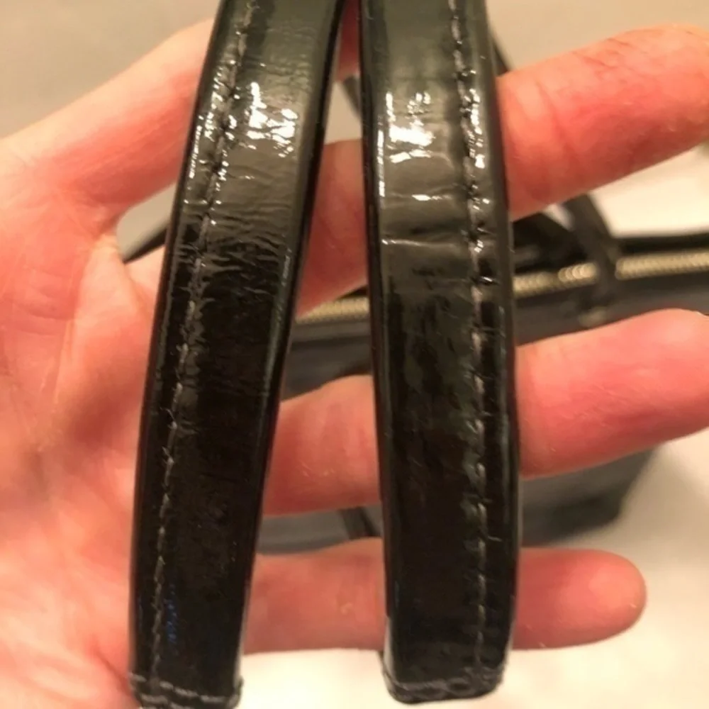 Coach black patent leather signature stitched tote